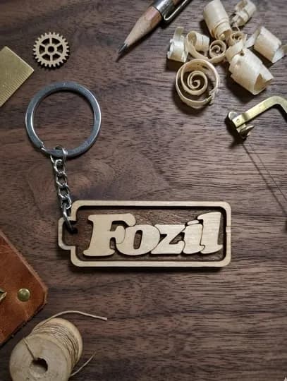 Fozil именной брелок